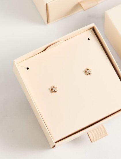 ARETES MINI FLOR EN ORO